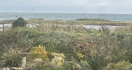 View from 'Room with a view' & front garden of whole property.