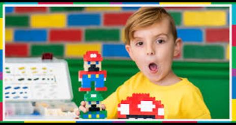 A child enjoying a lego workshop