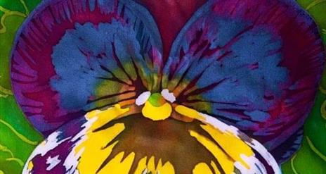 image of a purple and yellow flower