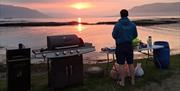 Taking a minute to enjoy the sunset after paddle boarding