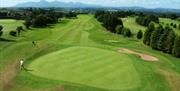 View down the Par 5 3rd hole towards the Mourne Mountains at St Patrick's Golf Club