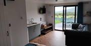 The bedroom and living area at Oakwood Glamping Mourne Mountains