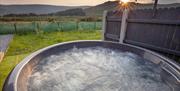 Hot tub overlooking the Mountains at Oakwood Glamping Mourne Mountains