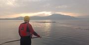 man enjoying the sunset in Carlingford Lough