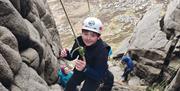 big smiles rock climbing Mourne Mountains with geology Rocks