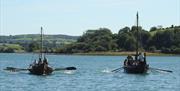 Magnus Viking Longboats sailing along Strangford Lough at Delamont Country Park