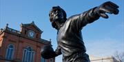 Pat Jennings Statue in Newry City with Newry Town Hall