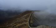 The Mourne Wall from Slieve Commedagh with low cloud