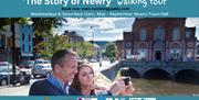 Image showing a couple stopping to take a selfie whilst enjoying the Story of Newry Walking Tour.