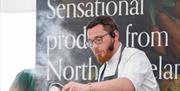 Eats and Beats Festival takes place on Saturday 7 and Sunday 8 September 2024 in Newcastle County Down. Chef cooking with local produce from Northern