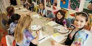 Children at painting class at Studio 23
