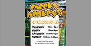 Poster showing opening times of cheeky monkeys play area