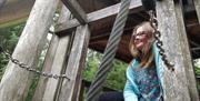 Enjoying the treehouse in Slieve Gullion Adventure Playpark in Slieve Gullion Forest Park