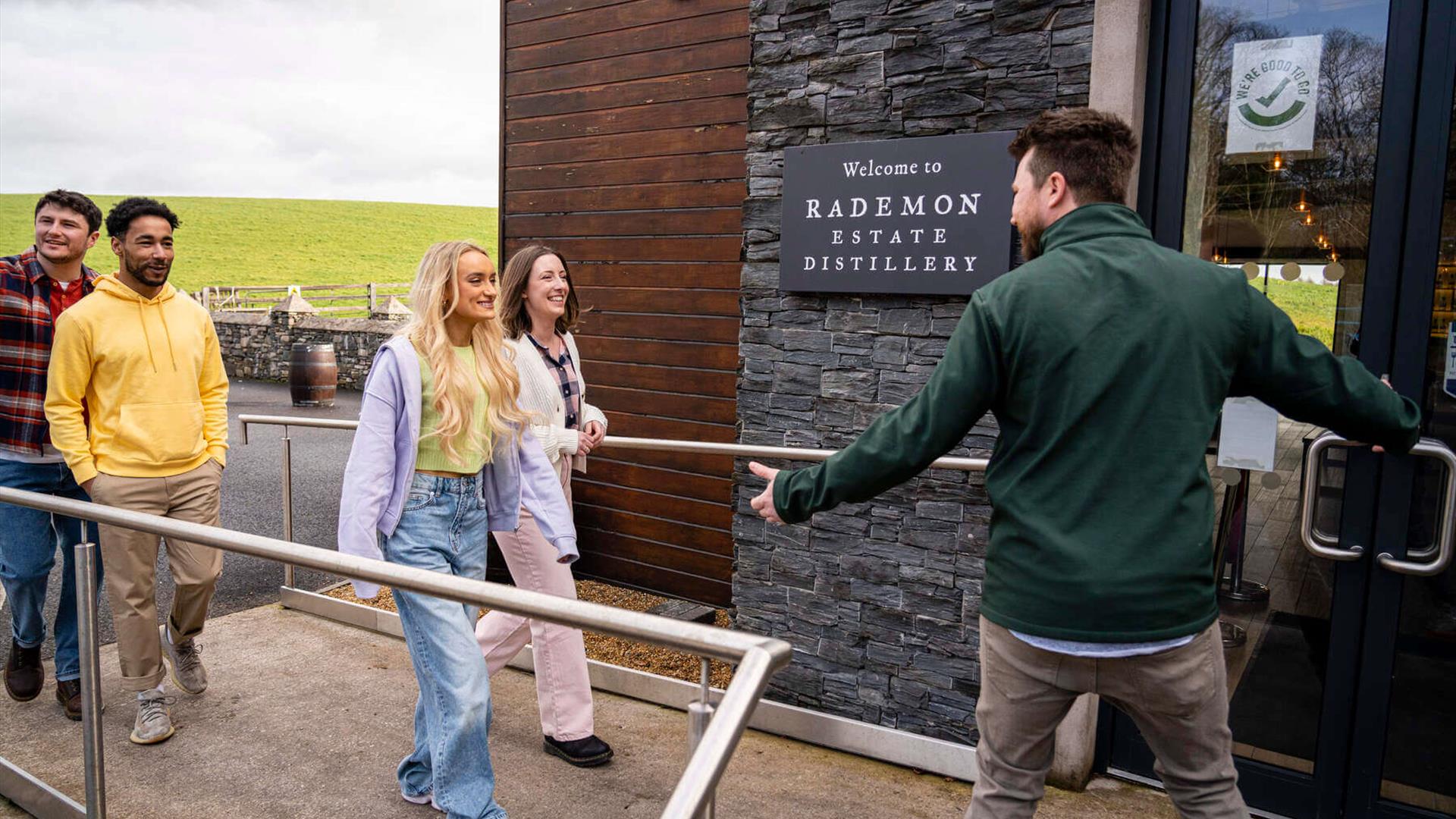 Group arrives at Rademon Estate Distillery and is welcomed by their guide