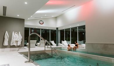 An image of a man and woman enjoying the spa facilities at Killeavy Castle Estate.