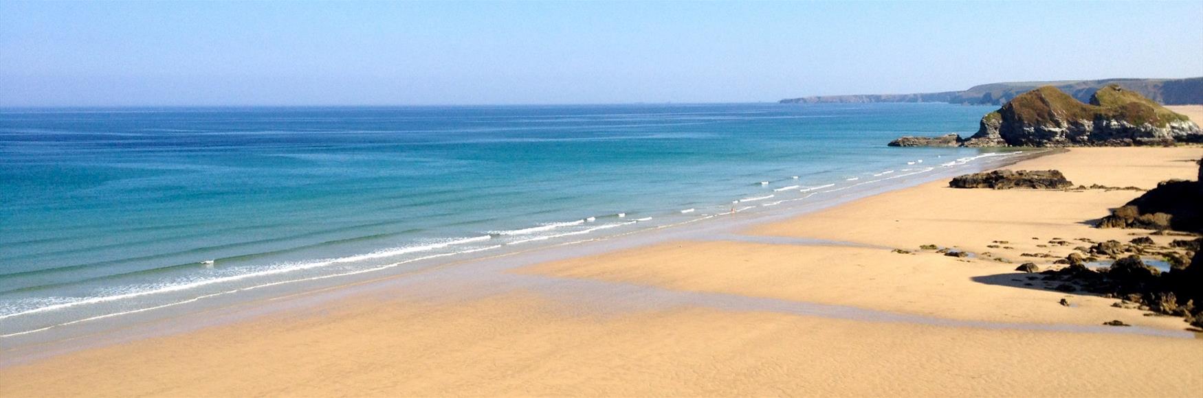 Walk from Towan Beach toward Lusty Glaze when the tide is low