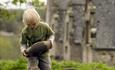 A child playing kayles at Trerice.