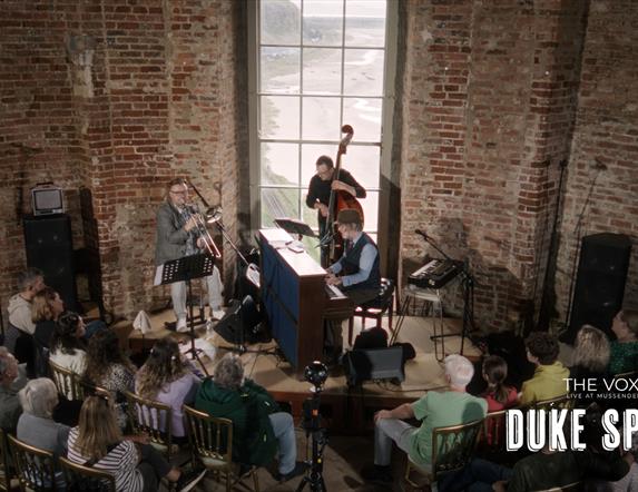 A photograph of Duke Special performing in Mussenden Temple.