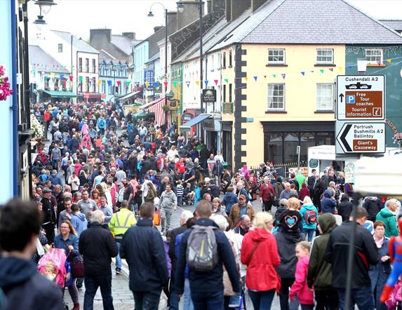 Crowds line the street in the Diamond