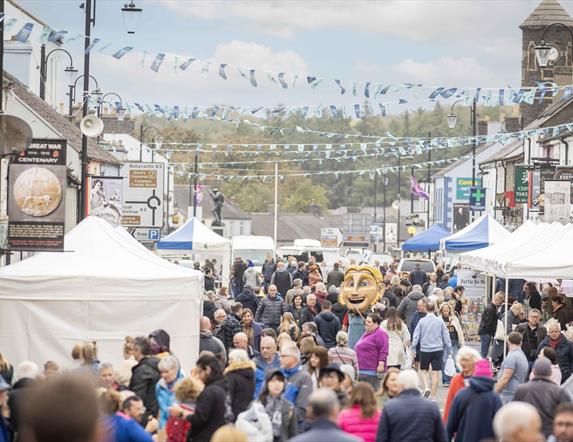 Crowds and stalls fill the main street in Bushmills