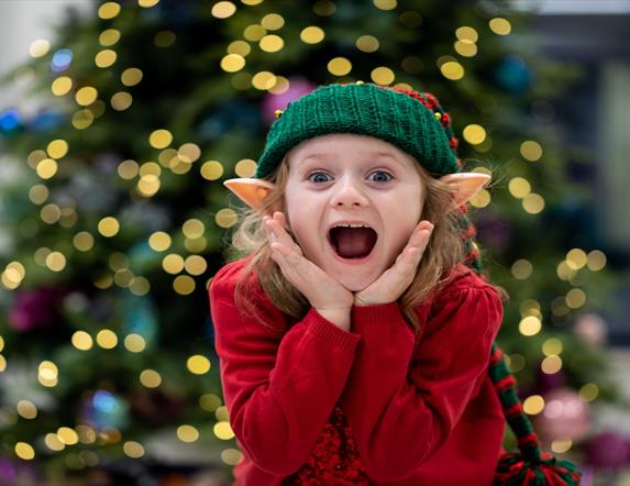 Child dressed as an elf.