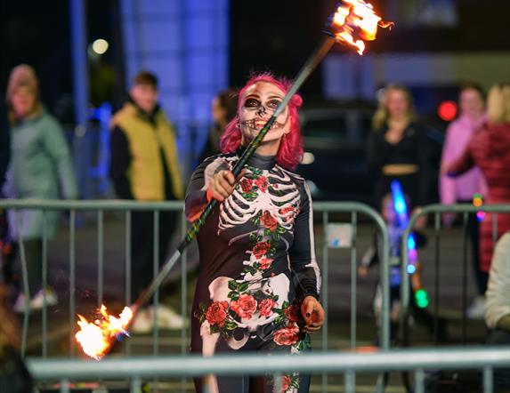 Skeleton fire juggler