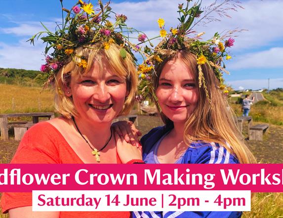 A mother and daughter wearing colourful, vibrant wildflower crowns