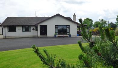 Outside view of house and garden