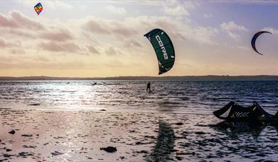 Kite surfers on the water