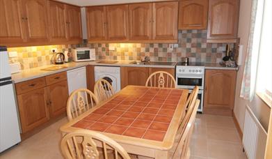 kitchen with dining table at No.6 - Strathroy Mews