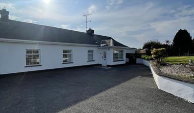 Spacious double bedroom to the back of the cottage with views of the countryside.