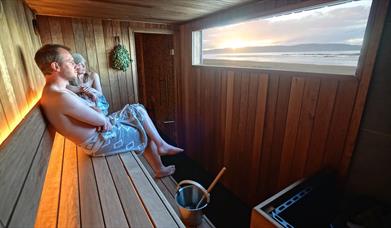 Couple enjoying a sauna