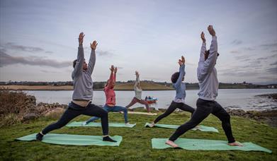 Sunrise SUP & Island Yoga Experience