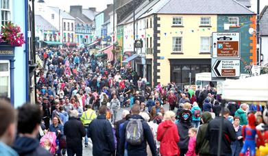 Crowds line the street in the Diamond