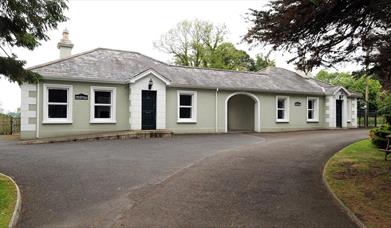 Image shows front of property and driveway