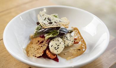 A plate of food on a restaurant table