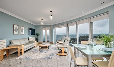 Picture of open plan kitchen diner looking out to Portstewart Harbour and the sea