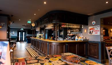 Rustic wooden panelled bar 