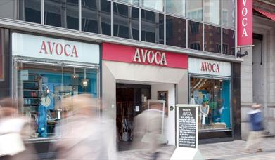 Exterior of a city centre shop selling household goods and food.