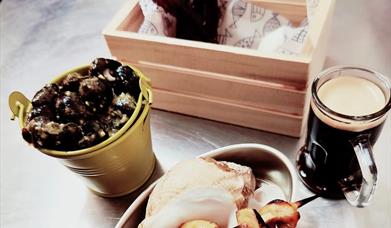 various seafood dishes sit on a table