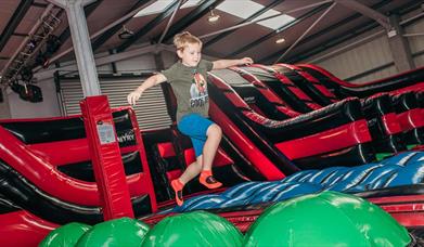 Boy Bouncing in the Airtastic Inflata Park