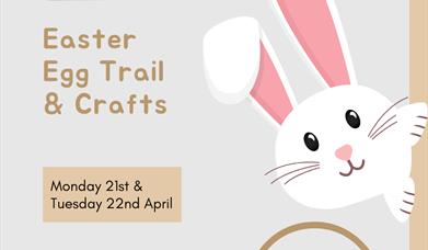 Cartoon image of a bunny and a basket full of Easter eggs with event details written