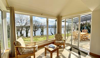 View of a sunroom at Shamrock Cottage, which overlooks Lough Erne, Co. Fermanagh, Northern Ireland.