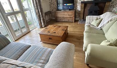 living room with fireplace and tv