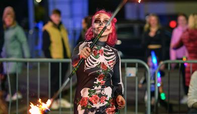 Skeleton fire juggler