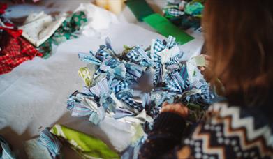 A rag rug make at the Ulster Folk Museum