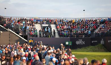 Crowds watching and enjoying The Open