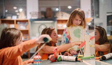 Image of a family in Discover Art at Ulster Museum