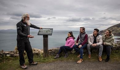 Flip shows a tour group the Game of Thrones info panel