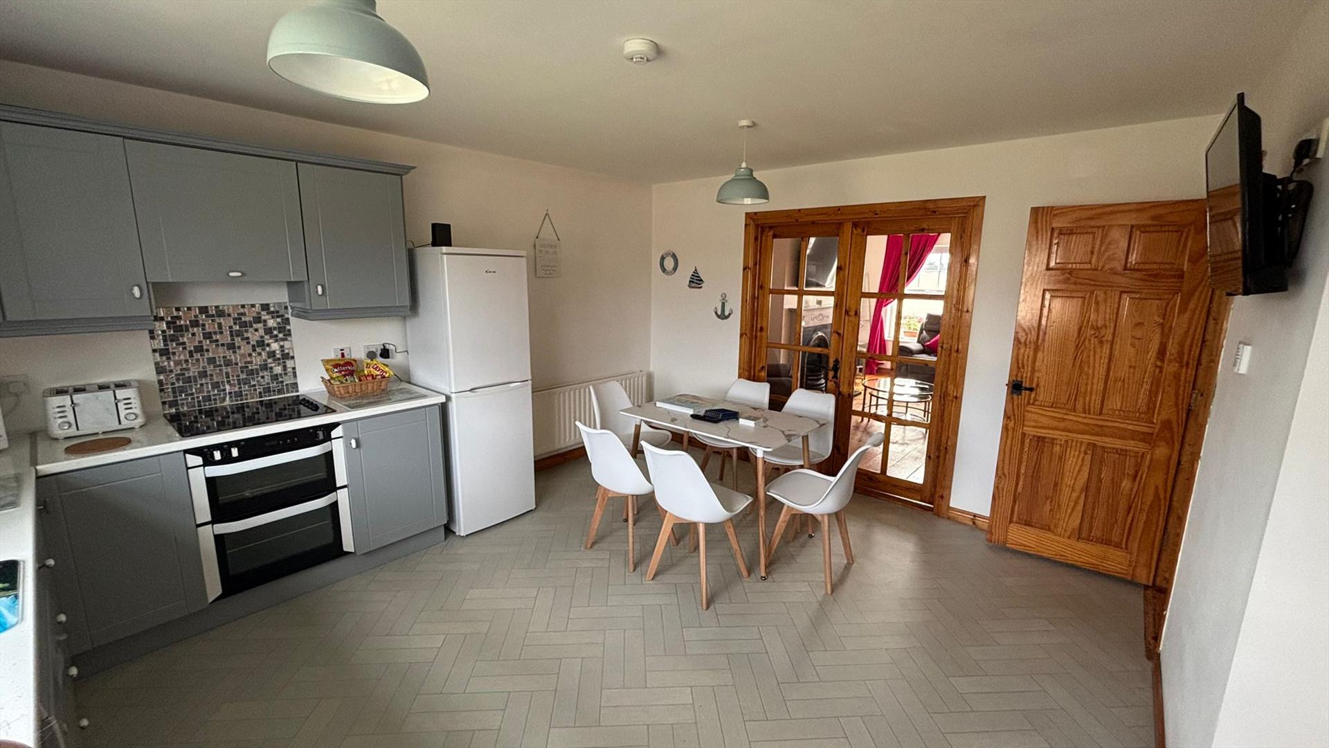 interior of kitchen and dining area at Primrose Seaside Escape